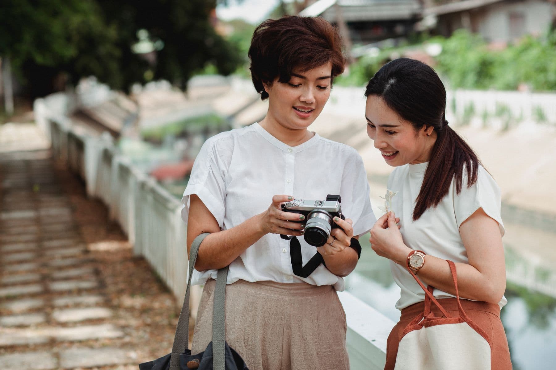 Two creators looking at photos together